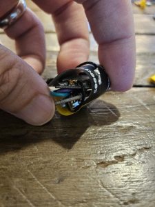 A tiny hand-built rocket altimeter tucked inside a BT-50 model rocket tube.